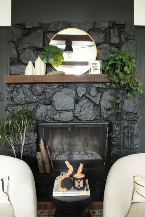 Black Stone Fireplace Ideas, Dark Painted Fireplace, Black Rock Fireplace, Paint A Stone Fireplace, Dark Stone Fireplace, Painted Rock Fireplaces, Painted Fireplaces, Carmeon Hamilton, Painted Stone Fireplace