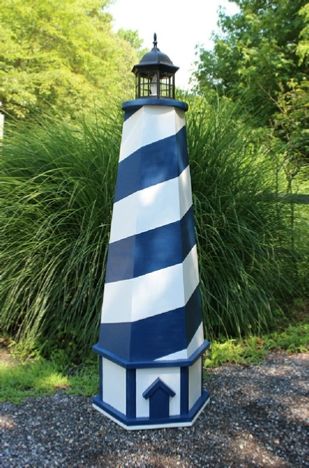 Downloadable woodworking plans show you how to build this attractive lawn lighthouse with base. The DIY plans include photos at every step and even show you how to paint the stripe. Yard Lighthouse, Lighthouse Project, Garden Lighthouse, Lighthouse Woodworking Plans, Pyramid Planter, Gazebo Bird Feeder, Diy Lighthouse, Downloadable Woodworking Plans, Lighthouse Crafts