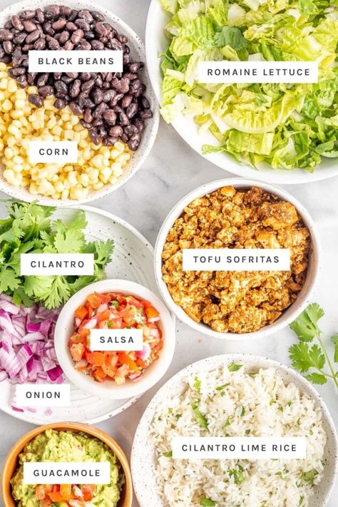 Chipotle inspired vegan burrito bowls are so easy to make at home and great for meal prep. Toppings include cilantro rice, tofu sofritas, black beans and corn salsa. Sofritas Burrito Bowl, Mexican Vegan Bowl, Mexican Veggie Bowl, Taco Bowl Vegetarian, Vegan Burrito Bowl Recipe, Burrito Bowl Vegan, Vegetarian Taco Bowl, Burrito Bowl Vegetarian, Tofu Burrito Bowl