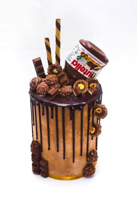 One of our most popular cakes... and its easy to see why. Our Nutella drip cake is sooooo decadently naughty how can one resist!   This cake is from our online range and is super easy to order one for your next event. Just click on the link below and youll be on your way to YUM city!!!!  http://bit.ly/2MNKNjv  Photo cred: Shot by Kyze Photography Popular Cakes, Naked Cakes, Drip Cake, Drip Cakes, How Can, Nutella, Super Easy, Are You The One, Most Popular