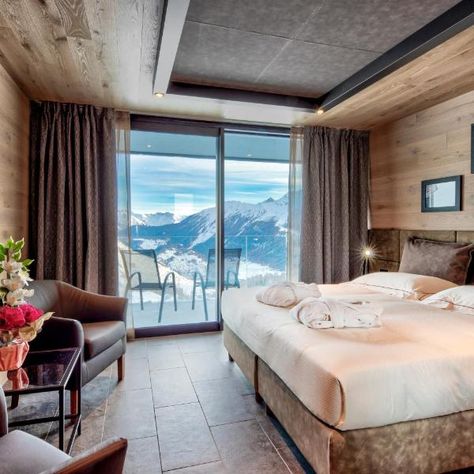 Hotel Re Delle Alpi Resort & Spa, 4 Stelle Superior is set at 6562 feet above sea level, right on the ski slopes, 5 mi from La Thuile town center. During winter, you can ski straight out of the hotel. During summer it's possible to reach hotel by car on road SS26. Re Delle Alpi Resort & Spa, 4 Stelle Superior is set on slope number 7, close to the Fourclaz chair elevator. This friendly and welcoming hotel has a nice veranda. Rooms come with parquet floor and wooden ceiling. Free Wi-Fi internet i Car On Road, Parquet Floor, Wooden Ceiling, Ski Slopes, Wooden Ceilings, Town Center, Number 7, Parquet Flooring, Sea Level