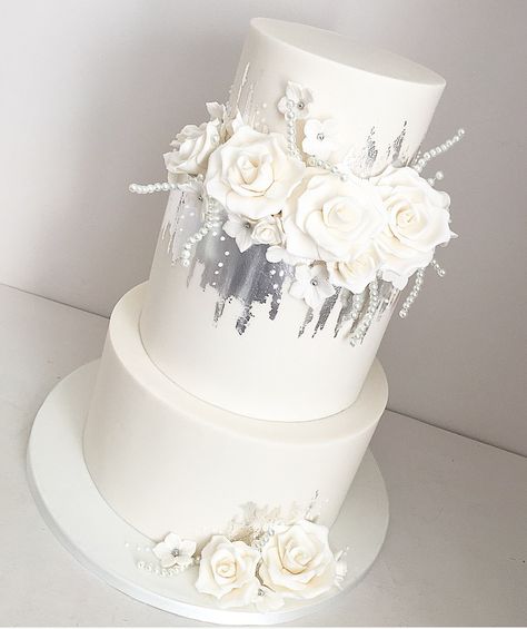 Silver leaf and bridal white wedding cake Silver And White Wedding Cake, Sequin Wedding Cake, Leaf Roses, 25th Wedding Anniversary Cakes, Fancy Wedding Cakes, Wedding Cake Pearls, Silver Wedding Cake, Wedding Anniversary Cakes, Square Wedding Cakes