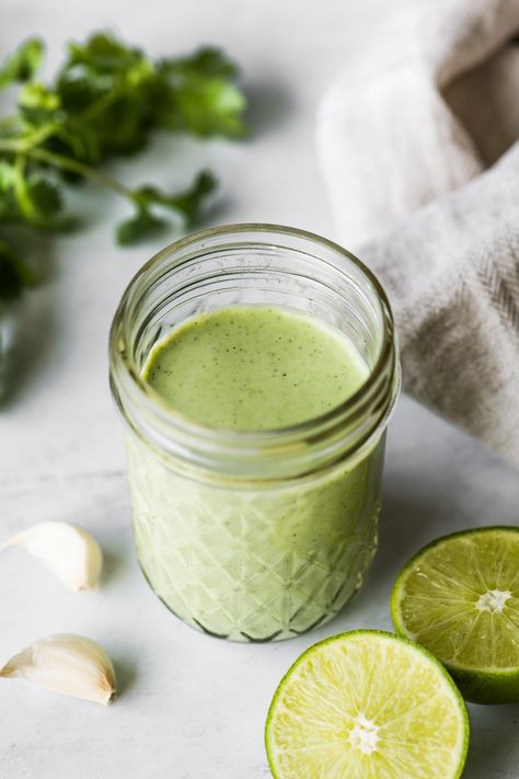 This Cilantro Lime Dressing is made with only 6 ingredients and is the perfect blend of tangy and creamy that's delicious drizzled on salads, tacos, burrito bowls and grilled meats! Healthy Enchiladas, Avocado Dressing Recipe, Avocado Cilantro Dressing, Creamy Jalapeno Sauce, Veggie Enchiladas, Enchiladas Healthy, Jalapeno Sauce, Soy Curls, Cilantro Dressing