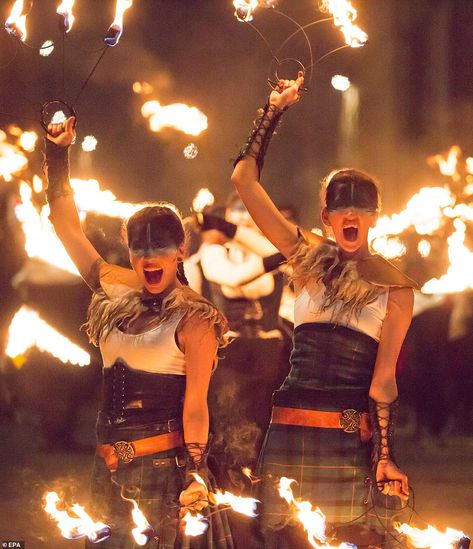 Hogmanay celebrations kick off in Edinburgh 40,000-strong torch procession | Daily Mail Online Hogmanay Traditions, Edinburgh Hogmanay, Together Symbol, Highlands Warrior, Scotland Culture, Strong Aesthetic, People Holding Hands, Scottish Dress, Fire Fans