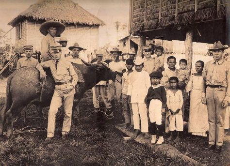 American Servicemen posing with a Carabao and with the locals in a township / sitio. undated, probably either in Lucena or in Tayabas. - simoun (image: Cpl. Joseph W. Kwiatkoski Company D, 9th Infantry US Army) Post Colonial Period In The Philippines, Pananakop Ng Espanyol Sa Pilipinas, American Period In The Philippines, Philippine Society, Primary Sources Activities, Filipino History, Philippines Manila, Philippine Government, Background Plain