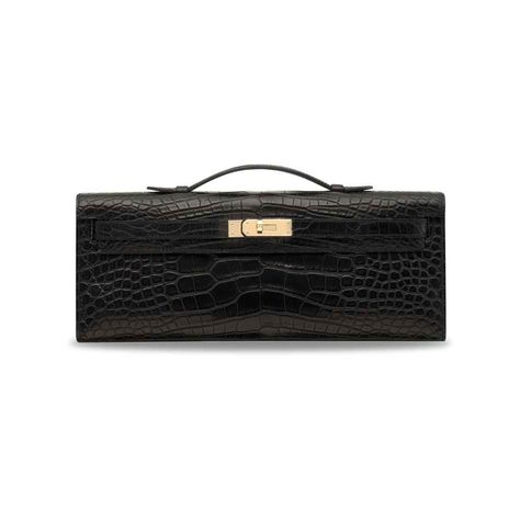 A MATTE BLACK ALLIGATOR KELLY CUT WITH PERMABRASS HARDWARE | HERMÈS, 2014 | 21st Century, bags | Christie's Hermes Kelly 25, Kelly Cut, Timeless Bags, Large Leather Tote Bag, Luxury Bags Collection, Womens Designer Bags, Large Leather Tote, Kelly Bag, Girly Bags