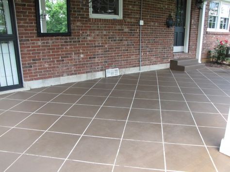 interesting way to update a concrete patio without having to tear out the concrete and completely re-do it. Tile Patio Floor, Diy Concrete Stain, Concrete Stain Patio, Concrete Painting, Painted Concrete, Faux Tiles, Concrete Stained Floors, Painted Patio, Patio Tiles