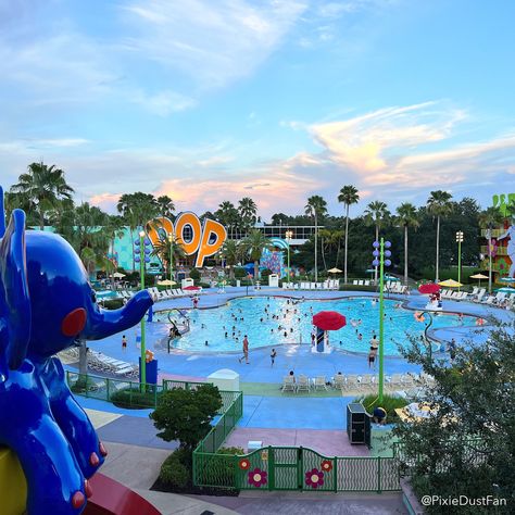 How important is the pool to you at your resort? The Hippy Dippy Pool at Disney's Pop Century Resort is always pretty "happening" and a ton of fun! #disneyspopcenturyresort #disneyresort #disneyhotelpool #poolsatdisney #popcenturyresort #popcenturypool #disneyfans #disneyworldtips #disneyworldpools Disney Pop Century Resort, Pop Century Disney World, Pop Century Resort, Pop Century, Disney Pop, Hotel Pool, Disney World Tips And Tricks, Disney Resort, Disney Trip