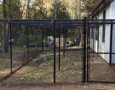 Dog Kennel & Utility Pens - Roma Fence GroupRoma Fence Group Chain Link Dog Run, Chain Link Chicken Run, Dog Area Ideas, Temporary Fence For Dogs, Outdoor Dog Kennels, Portable Dog Fence, Black Chain Link Fence, Dog Kennel Flooring, Dog Kennel Panels