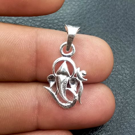 Silver Om Charm, Divine Hindu God Ganesh Pendant, 925 Sterling Silver Jewelry Hindu, Religious Locket, Spiritual Gift ▶ PRODUCT DETAILS ✪ Item Code:----------SJSP-1068 ✪ Metal:-----------------925 Sterling Silver ✪ Item Dimension (L x W ) 1.90 x 1.20 cms (Approx.) 1 Pc Chain Weight - 2.25 Grams (Approx.) (18" Inch) 1 Pc Pendant Weight - 1.55 Grams (Approx.) ▶ THIS PRODUCT CAN BE GIFTED ON THE FOLLOWING OCCASIONS:- Christmas Gift, Wedding Gift, Mother Day Gift, Valentine Day Gift, Birthday Gift, Ganesh Pendant, God Ganesh, Black Friday Jewelry, Friendship Day Gifts, Om Charm, Indian God, Valentine Day Gift, Silver Jewellery Indian, Mother Day Gift