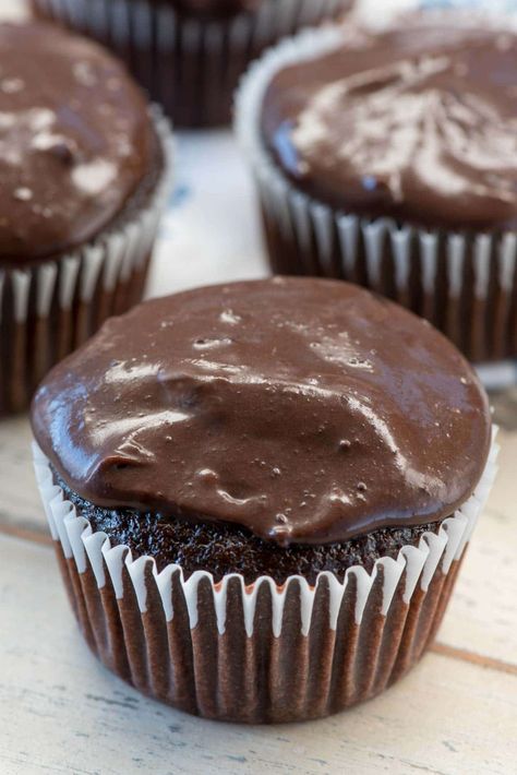 The BEST chocolate cupcake recipe is topped with the most heavenly and gooey chocolate frosting. Cooked Chocolate Frosting Recipe, Ganache Cupcakes, Chocolate Ganache Cupcakes, Cooked Frosting, Fudge Cupcakes, Chocolate Orange Cupcakes, Chocolate Fudge Cupcakes, Sour Cream Frosting, Best Chocolate Cupcakes