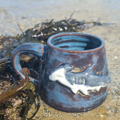 Morning ! I had a lovey walk on the beach yesterday in the sun, took one of the hammerhead shark mugs down for a photoshoot, as you do 🤣. Today's jobs include finishing packing your lovely orders and sorting out a selection of pieces to take into @craftsnorthwales #sharkmug #mugshot #mugshotmonday #mugsonthebeach #hammerheadshark Shark Ceramic, Shark Mug, Ideas For Ceramics, Walk On The Beach, Mug Ideas, Hammerhead Shark, Blue Pottery, Beach Walk, Pottery Painting