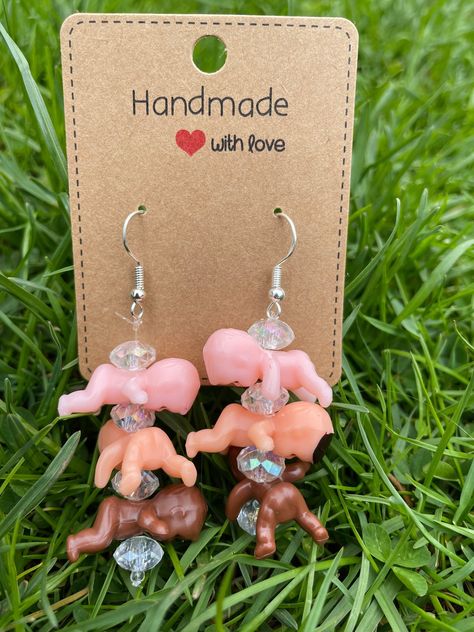 Weird Earrings, Weird Jewelry, Plastic Babies, Funny Pix, Baby Earrings, Funky Earrings, Tiny Earrings, Very Funny Pictures, Funky Jewelry