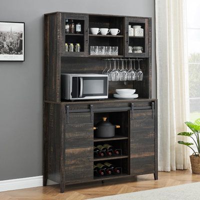 【Farmhouse Bar Cabinet with Sliding Barn Door】Featuring two flexible sliding barn doors, this rustic wine cabinet provides easy access to storage while saving space. The sliding door with farmhouse sign create an elegant, farmhouse ambiance in your living space. Flexibly use it as a alcohol cabinet, kitchen pantry, china cabinet, coffee bar station, microwave stand, kitchen cupboard, credenza, storage cabinet. Color: Dark Oak | Rubbermaid Farmhouse Bar Cabinet w / Sliding Barn Door, 70" Rustic B