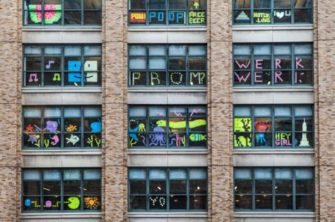 The elaborate designs demonstrate the creative talents of employees, as well as a rather impressive ability to put off doing actual work. Post It Art, New York Buildings, Big Screen Tv, Post It Note, Lower East Side, Post It Notes, Office Building, Photo Posters, Post It