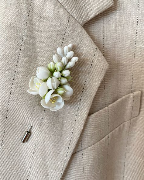 This wedding blossom lapel pin is fully handmade. Each element (flower, petal or leaf) is made entirely by hands from material called cold porcelain and toned with soft pastel. These flowers look much like fresh flowers but they will never fade.  This wedding boutonniere is absolutely unique and perfect for weddings and other celebrations. But also it will be good even as casual accessory. Flowers are tender and delicate.  length - 3 inches (7,5 cm) Care: You should treat with care this product. If it is dirty, do not worry. Just wipe with a slightly damp cloth. Delivery: All products are securely packed in special containers to avoid any damage during delivery. You will get your flower accessory in nice gift box. I will gladly make something special for you. Feel free to ask me for person Men’s Boutonnieres, Flower Lapel Pin Men, Wedding Blossom, Unique Boutonniere, Lapel Flower Wedding, Groom Lapel Pin, Brooch Boutonniere, Floral Lapel, Masquerade Theme