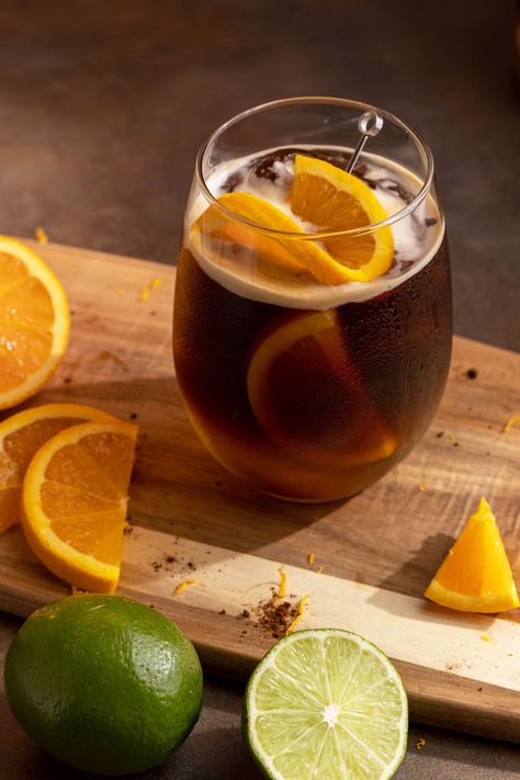 Espresso tonic with orange slices on a wooden board. Espresso Tonic Recipe, Espresso Tonic, Valentine 2024, Brown Sugar Simple Syrup, Tonic Recipe, Orange Wheels, Homemade Syrup, Tonic Water, Iced Latte