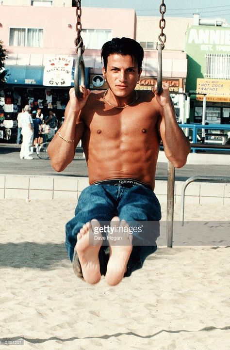 Peter Andre poses on Muscle Beach at the height of his singing career, in January 1996 in Los Angeles, California. Peter is one of the 10 celebrities appearing in the new series of 'I'm A Celebrity, Get Me Out Of Here' which begins on Monday January 26, 2004. 70s Guys, Bbc Casualty, Peter Andre, Vocal Training, Muscle Beach, Singing Career, Vocal Coach, Mysterious Girl, Singing Lessons