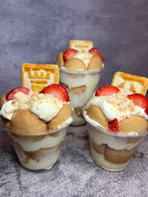 Banana pudding with strawberries are so good Strawberry Banana Pudding Cookies, Strawberry Banana Pudding Cups, Banana Pudding With Strawberries, Strawberry Cheesecake Banana Pudding, Strawberry Banana Pudding Recipe, Strawberry Banana Pudding, Banana Pudding Cups, Banana Pudding Cookies, Candy Business