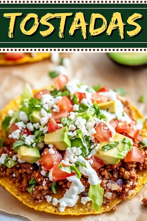 These easy Mexican tostadas are the perfect addition to any fiesta! Made with ground beef, refried beans, lettuce, tomato, cheese, and toppings, they're just too good! Mexican Beef Tacos Recipes, Ground Beef Taco Recipes For Dinner, Mexican Tostada Recipes, Authentic Tacos Ground Beef, Tostados Recipe, Ground Beef Mexican Recipes, Mexican Dishes Authentic, Ground Beef Refried Beans, Mexican Ground Beef Recipes