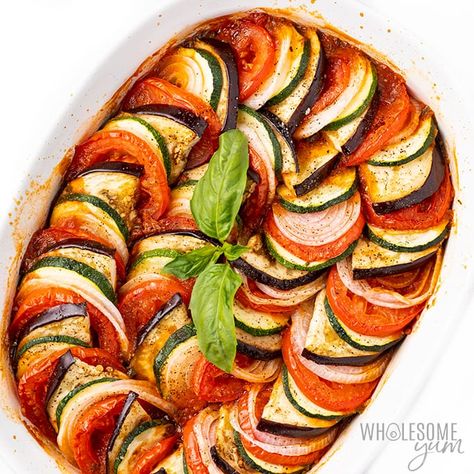 The Best Easy Baked Ratatouille Recipe | Wholesome Yum Baked Ratatouille Recipe, Ratatouille Dish, Baked Ratatouille, How To Make Ratatouille, Vegetarian Christmas Dinner, Easy Ratatouille Recipes, Vine Tomatoes, Vegetarian Christmas, Ratatouille Recipe