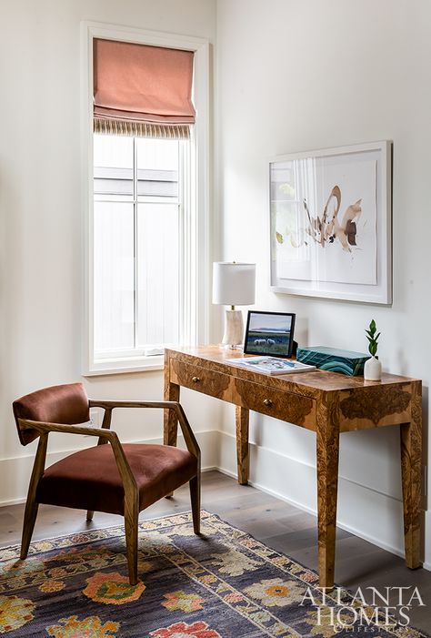 Multifaceted and mindful were cornerstone concepts for Stephanie Andrews of Balance Design when designing her guest retreat. An abstract mural draws the eye up the 16-foot ceiling, punctuating the space with a cheerful yet soothing statement. Hues from its playful palette continue into the powder room with its perfectly moody mauve hue. The swinging bed, however, is the prized focal point of the two spaces. Chic Office Design, Swinging Bed, Atlanta Homes And Lifestyles, Abstract Mural, Kitchen Suite, Playful Palette, Balance Design, Guest Room Office, Bed Swing