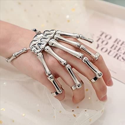 Skull Skeleton Hand Bracelet with Ring for you
Metals Type: alloy
Color: silver
Ideal Gifts-The skull bracelet is the best gift for Halloween, you can wear it yourself or send it to the one you love. Skeleton Hand Bracelet, Finger Ring Bracelet, Hand Bracelet With Ring, Punk Skeleton, Skeleton Finger, Skeleton Bracelet, Skeleton Jewelry, Punk Rock Jewelry, Finger Bracelets