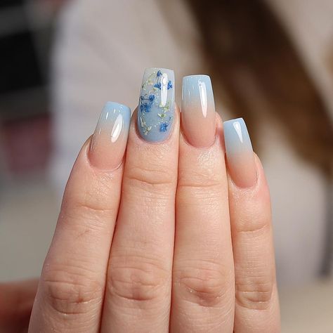 THE NAIL COMPANY SIDCUP on Instagram: “Cinderella  Nude ombre Encapsulated flowers . . . #nails #nailsofinstagram #nailart #naildesigns #nailsmagazine #encapsulatednails…” Ombré Flower Nails, Encapsulated Nail Designs, Light Blue Flower Nails, Ombre Nails With Flowers, Light Blue Nails With Flowers, Nail Encapsulated Design, Flower Encapsulated Nails, Encapsulated Blue Nails, Dried Flower Acrylic Nail Designs