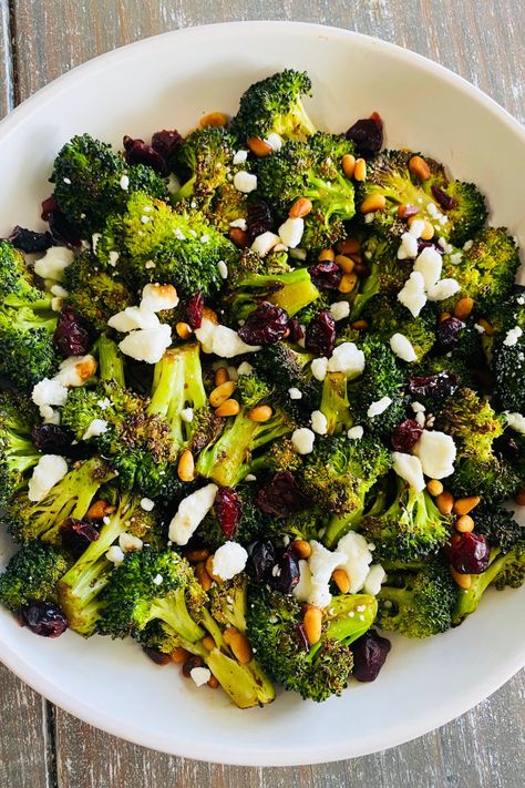 broccoli topped with cranberry and goat cheese Broccoli And Goat Cheese, Thanksgiving Sides Broccoli, Green Side Dishes For Christmas, Brócoli Side Dish, Christmas Broccoli Side Dishes, New Year Side Dishes, Brocolli Thanksgiving Side, Best Christmas Vegetable Side Dish, Holiday Broccoli Recipes