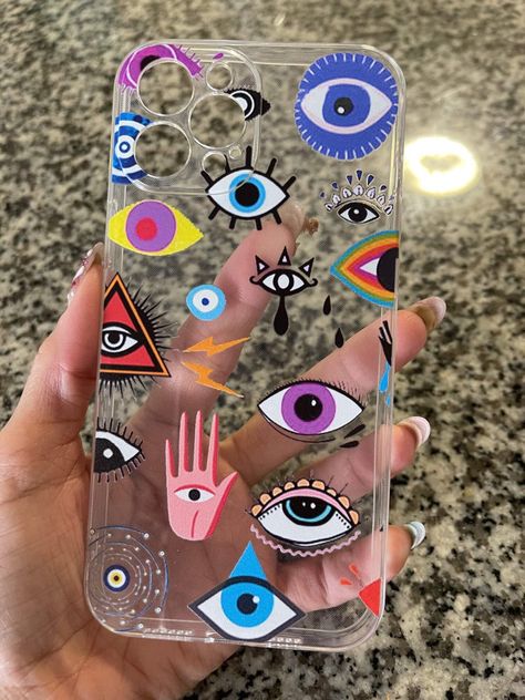 Blue eye evil iPhone case Transparent Mobile Cover Diy, Case Iphone Design, Painted Phone Case Diy, Case Painting Ideas, Iphone Case Painting, Phone Case Painting Ideas, Creative Phone Cases, Phone Cover Painting, Mobile Cover Design