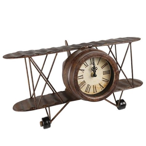 A great addition to any aircraft enthusiasts' desk or bookshelf. This retro look timepiece features a vintage style propeller airplane outlook with a vintage rustic finish. Propeller Airplane, Airplane Propeller, Metal Desk, Deco Salon, Metal Desks, Tabletop Clocks, Desk Clock, Reading Room, Creative Home