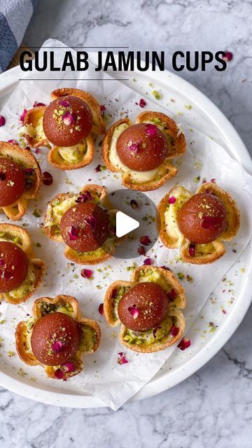 Shweta Singh on Instagram: "Gulabjamun Cups - Save for later 🎨  I have shared this recipe before and I am sharing  again. This is one of my hit recipes and if you want you can make these gulab jamun cups for your Holi party. They not only look beautiful but taste amazing too. You just need bread, gulab jamun and cream cheese frosting. If you want you can also use rabari or butter cream or cream frosting. Make your cups beforehand and assemble few hours before you plan to serve. Enjoy!  Bread Cups   Cut white bread into circle using a cookie cutter. Make it thinner with a rolling pin. Brush with ghee or melted butter. Place bread circles in greased muffin molds (see video) Pre heat oven to 360 F. Bake cups at 360 F for 8-10 mins.  Once they are out, let them cool down completely.   *️⃣NOTE Gulab Jamun Recipe Video, Rabri Recipe, Gulab Jamun Recipe, Jamun Recipe, Holi Party, Healthy Sweet Snacks, Gulab Jamun, Diwali Party, Indian Dessert