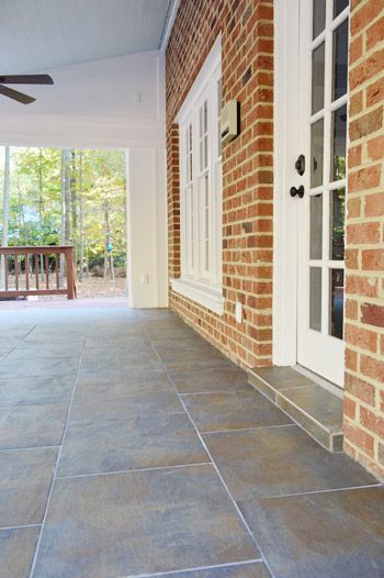 Gorgeous but labor-intensive tile laid over concrete on a porch | Young House Love Tile Patios Over Concrete, Patio Tiles Over Concrete, Outdoor Tiles Floor, Outdoor Tile Patio, How To Tile, Cooking Outdoors, Outdoor Tile, Adirondack Furniture, Porch Tile