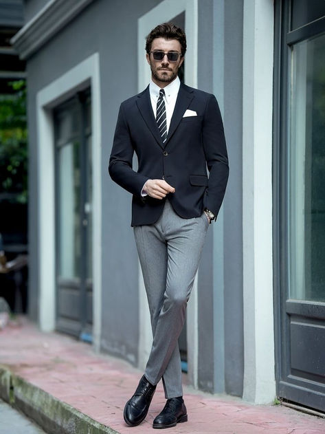 Man wearing a black single-breasted blazer with grey pants, showcasing a sharp and stylish look for formal and smart-casual occasions. Black Blazer With Grey Pants Men, Black Blazer Men Outfit, Men Black Blazer Outfit, Slim Fit Body Type Men, Male Office Outfit, Black Blazer Combination, Mens Blazer Outfit Formal, Men Blazer Outfit For Wedding, Business Professional Men