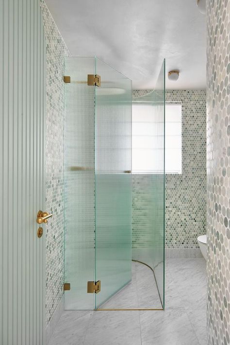 Tour a Bondi Beach apartment energised with colours and curves | Belle 70’s Bathroom, 70s Apartment, Glass Shower Screen, Greg Natale, Australian Interior, Green Interior Design, Reeded Glass, Australian Interior Design, Holiday Vibes