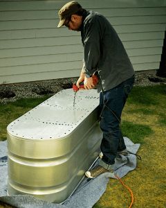 Galvanized Tub Vegetable Garden, Galvanized Container Gardening, Galvanized Stock Tank Garden Ideas, Galvanized Trough Planters, Galvanized Vegetable Garden, Troughs As Planters, Water Trough Planter Vegetable Garden, Horse Trough Garden Raised Beds, Water Trough Garden Vegetables