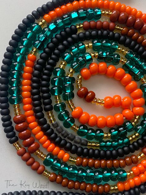 Waist beads with teal, black, brown, orange and gold. Waist Bead Designs, Waist Beads African Plus Size, West African Waist Beads, Orange Waist Beads, African Waist Beads Color Meaning, Cheap Spiritual Colorful Waist Beads, Waist Beads African Belly Chains, Waist Beads African, Women Choker Necklace