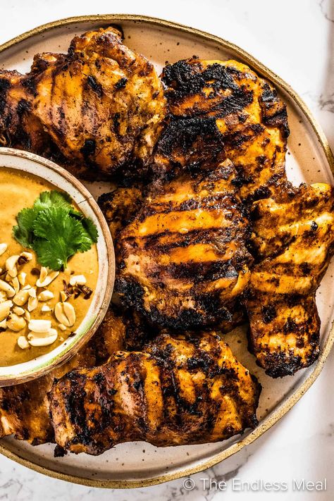 Switch up your everyday chicken with this Thai chicken marinade! It's made from scratch with only real ingredients and delivers big bold Thai flavor. Grill or bake it, and serve it with some rice and a salad for a quick and easy meal that's ready in just 35 minutes! #theendlessmeal #chickenmarinade #marinade #thai #thaichickenmarinade #thamarinade #bbqmariande Thai Chicken Seasoning, Thai Chicken Marinade, Spicy Chicken Marinades, Tai Food, Garlic Chicken Marinade, Thai Grilled Chicken, Easy Chicken Marinade, Chinese Foods, Chicken Marinade Recipes