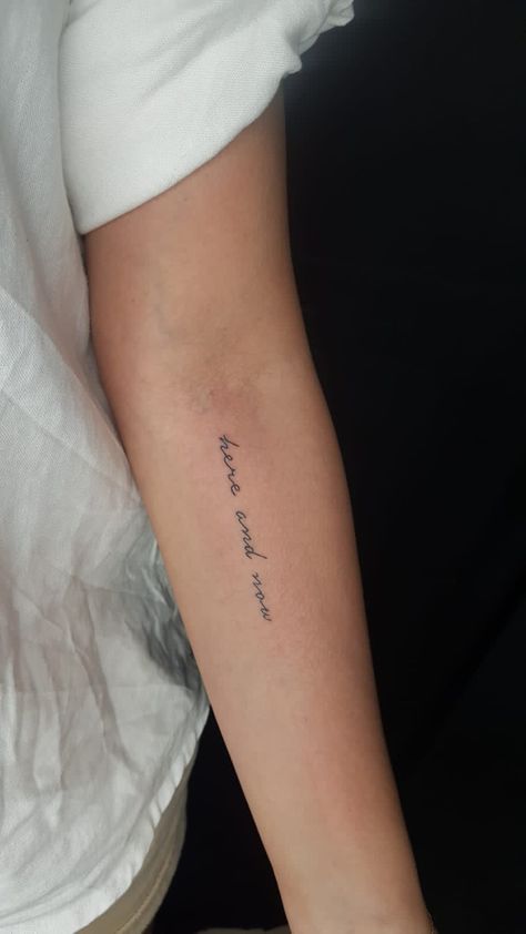 Arm tattoo for women Worry Tattoo, Here And Now Tattoo, Tiny Arm Tattoos For Women, Mindfulness Tattoo, Meaningful Word Tattoos, Tattoo Placement Arm, Quote Tattoos Placement, Happiness Tattoo, Tiny Tattoos For Women