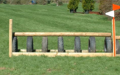 Tire XC jump Tire Jumps Horse, Diy Cross Country Jumps, Cross Country Course, Xc Jumps, Horse Jumping Exercises, Diy Pole Barn, Stadium Jumping, Riding Exercises, Cross Country Jumps