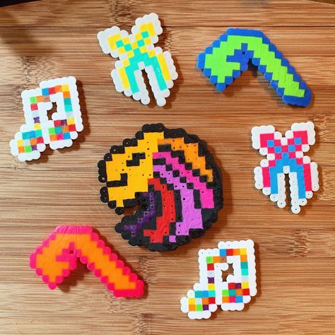 Seven lions, anjuna family, excision edm perlers by @emmakapotes Lsdream Perler Pattern, Seven Lions Perler, Perler Bead Patterns Edm, Perler Bead Rave Patterns, Edm Dj Perlers, Atliens Edm Perler, Edm Perler, Excision Perler, Melty Bead Patterns