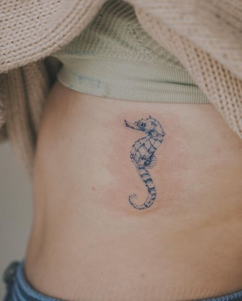 Tiny seahorse inspired by a previous flash for @grainneroisin 🌊 Had SO much fun with this piece and am now deeply obsessed with blue tattoos 😩 . . . #seahorse #seahorsetattoo #bluetattoo #ribtattoo #seahorses #seahorsetattoos #lafemmemelbourne #melbournetattoostudio #melbournetattoos #tattooartists #juniortattooartist #tattooportfolio #lafemme #southmelbourne #melbournetattoo #melbournetattooist #inked #ink #tats #melbournetattooartist #fineline #finelinetattoo #finelinetattoos #calmyourtats... Tiny Seahorse Tattoo, Simple Seahorse Tattoo, Sea Horse Tattoos, Sea Horse Tattoo, Physical Aesthetic, Blue Tattoos, Heart Tat, Melbourne Tattoo, Seahorse Tattoo