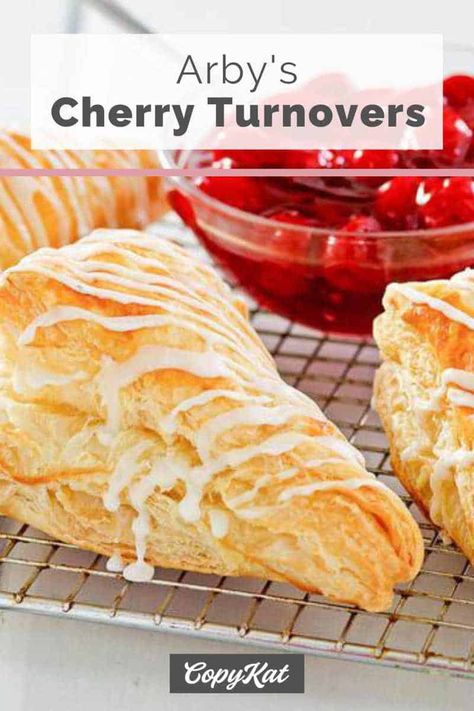 You have to see how easy it is to make cherry turnovers with puff pastry and pie filling. It's so simple to do with this Arby's copycat recipe and video. Delight your family and friends with a light and flaky dessert pastry. #turnovers #cherry #dessertrecipes #dessertideas #easydessert #copycat #copycatrecipe #puffpastry Cherry Turnovers With Puff Pastry, Fruit Turnovers, Turnovers With Puff Pastry, Pastry Turnovers, Cherry Turnovers, Fast Dessert Recipes, Turnover Recipes, Blueberry Pie Filling, Copykat Recipes