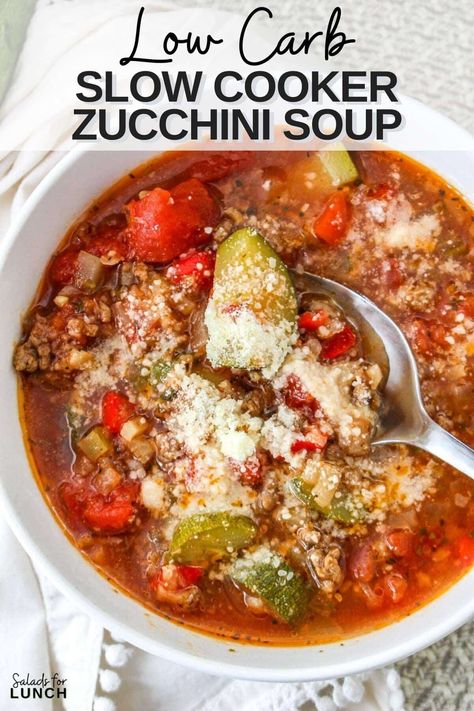 Close up of a tomato based low carb soup recipe with ground beef, zucchini, celery and cheese in a whote bowl with a silver spoon. Keto Zucchini Soup, Low Carb High Protein Slow Cooker Meals, Crockpot Zucchini Recipes, Zucchini Chili Recipe, Low Carb Stew, Fall Soups Crockpot, Healthy Delicious Soups, Sausage Slow Cooker, Low Carb Vegetable Soup