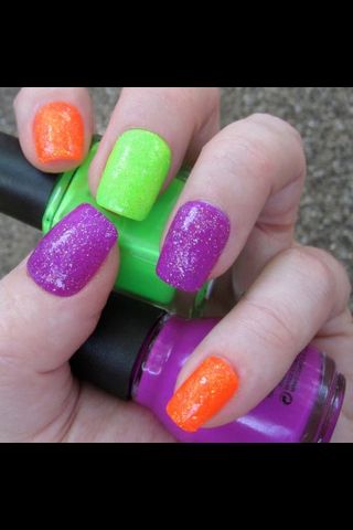 Green purple and orange nails plus sparkly Halloween Nails Purple Green Orange, Nail Themes, Kids Nails, Neat Nails, Holloween Nails, Neon Glitter, Gel Nails At Home, Cute Halloween Nails, Glitter Bomb