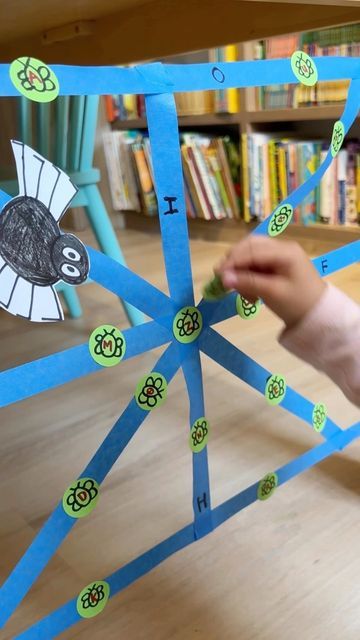 Fynn Sor | Happy Tot Shelf on Instagram: "Your child will have so much fun with this letter matching activity! Make this Sticky Alphabet Spider Web with painter’s tape and have your child paste the ‘fly’ to the web by matching the letters. .. 👉🏻 Recommended for ages 2 to 5yo ⭐️ Find more fun hands-on learning activities over at @happytotshelf . . #htspreschoolers #htstoddlers #learningisfun #handsonlearning #preschoolactivities #toddleractivities #homelearning #earlylearning" Spider Web Activity, Letter Matching Activities, Class Art Projects, Letter Matching, Matching Activity, Hands On Learning, Home Learning, Early Learning, Spider Web