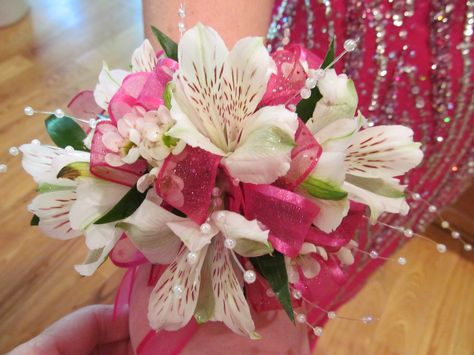 astromerian wrist corsage with ribbon and pearl sprays Corsage With Ribbon, Corsage For Prom, Raspberry Cottage, Homecoming Flowers, Prom Corsages, Wrist Corsage Prom, Prom Corsage And Boutonniere, Homecoming Corsage, Wrist Corsages