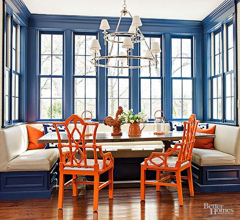 Blues, corals, greens, yellows. No shade of color is too much to use on boring woodwork. Our inspirational DIY ideas will help you choose the right color palette for your space -- dining room, bedroom kitchen, living room, or any other room in your home! Blue And Orange Living Room, Blue Windows, Orange Chairs, Kitchen Banquette, Living Room Orange, Dining Room Colors, Dining Chair Design, Sopot, Blue Decor