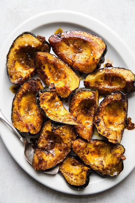 Brushed with a sweet-and-smoky spiced butter, this roasted acorn squash recipe is simple, cozy winter fare at its finest. Thanksgiving Vegetables Side Dishes, Thanksgiving Vegetable Sides, Winter Squash Recipes, Roasted Acorn Squash, The Modern Proper, Modern Proper, Spiced Butter, Acorn Squash Recipes, Thanksgiving Recipes Side Dishes