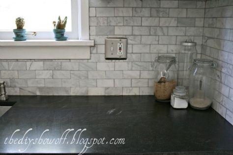 Love the Marble Backsplash w/ the Black Granite Countertops.  Granite is Virginia Jet Mist granite. Dark charcoal grey with random white veining.  Closest find to soapstone.  DIY Show Off ™ – DIY Decorating and Home Improvement Blog Tile Countertops Diy, Tile Countertops Kitchen, Soapstone Counters, Trendy Kitchen Backsplash, Honed Granite, Black Granite Countertops, Diy Shows, Tile Countertops, Marble Backsplash